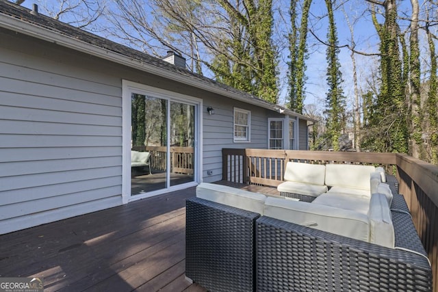 deck featuring an outdoor living space