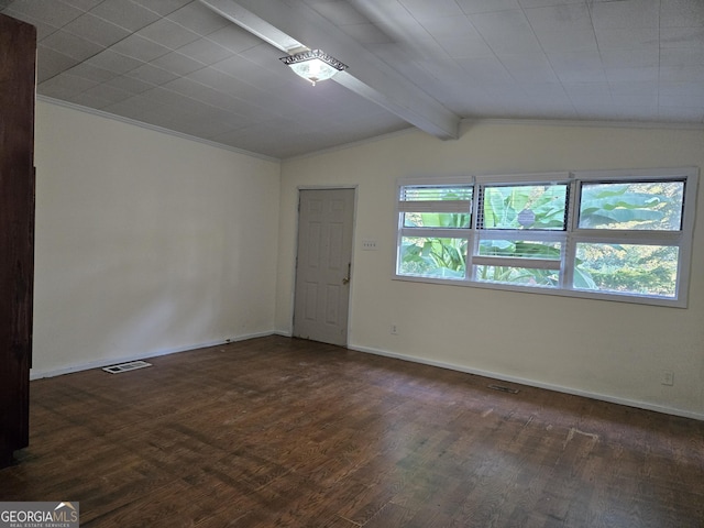 spare room featuring crown molding, dark hardwood / wood-style flooring, and vaulted ceiling with beams