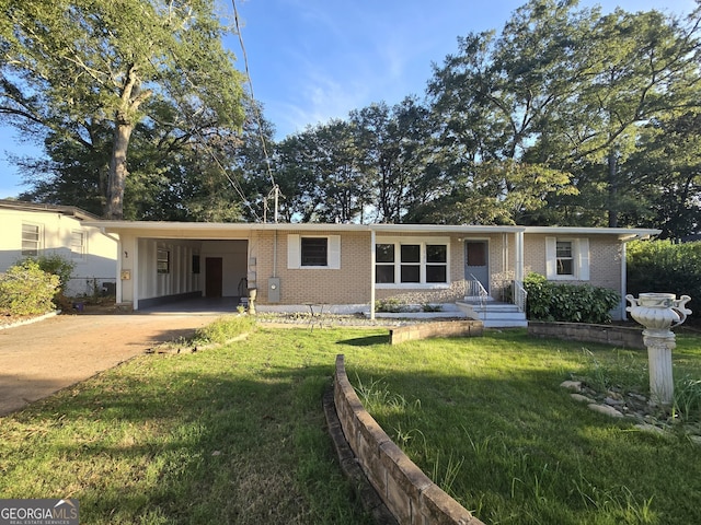 ranch-style house with a carport and a front lawn