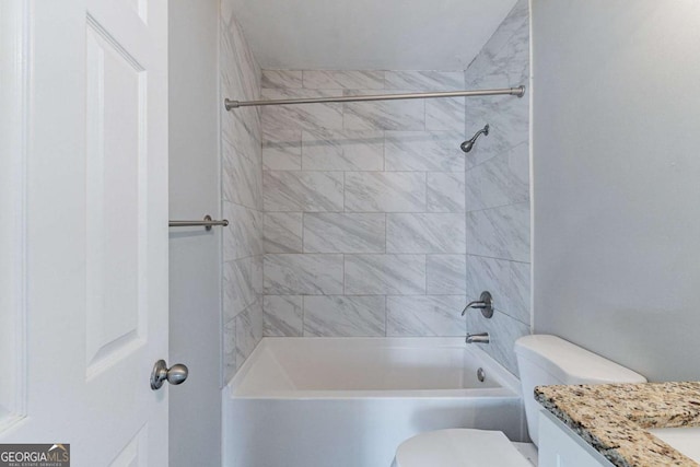 full bathroom with vanity, toilet, and tiled shower / bath combo