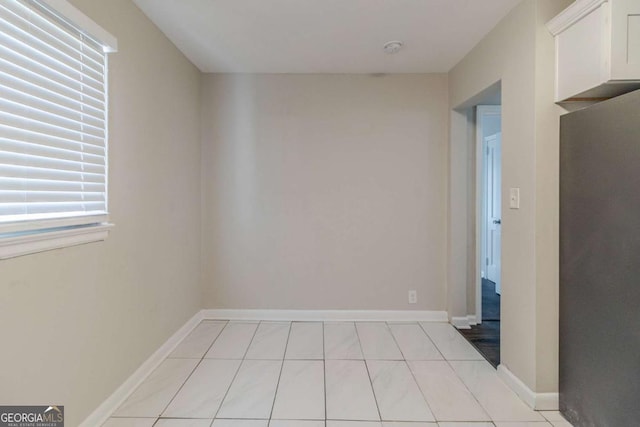 view of tiled spare room