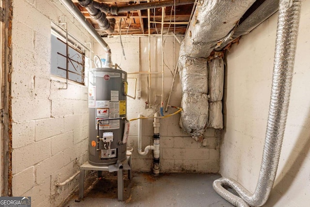 utility room with gas water heater