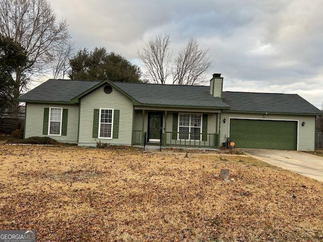 ranch-style home with a garage