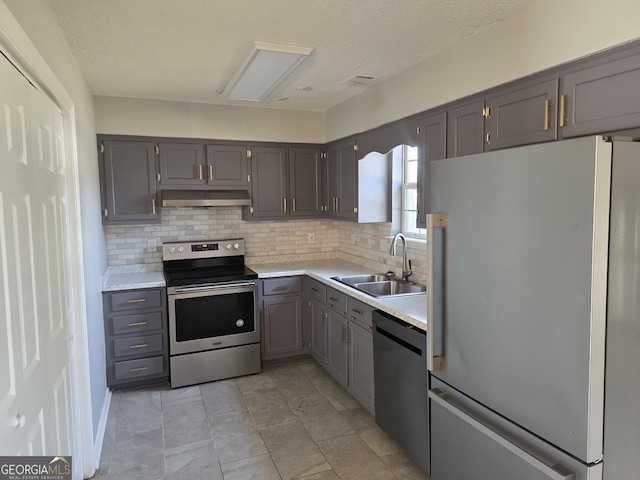 kitchen with sink, dishwasher, backsplash, electric range, and high quality fridge