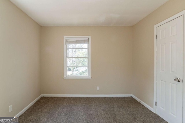 empty room featuring carpet floors