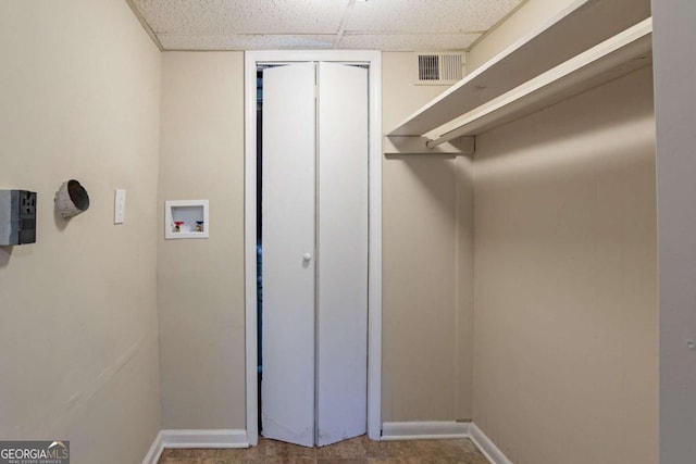 clothes washing area featuring washer hookup