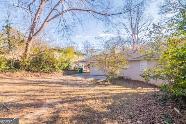 view of yard with a patio area