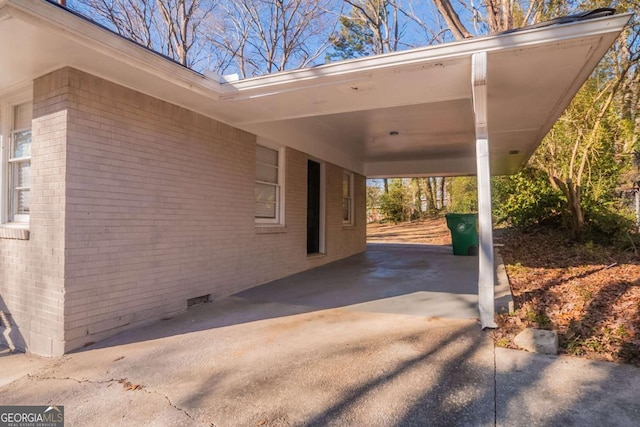 view of patio / terrace featuring a carport