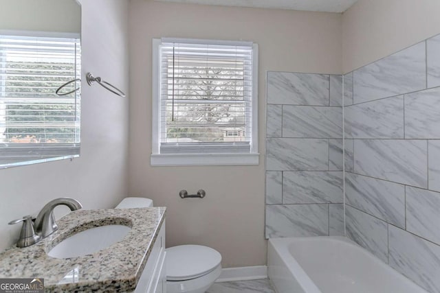 full bathroom featuring shower / tub combination, a healthy amount of sunlight, toilet, and vanity