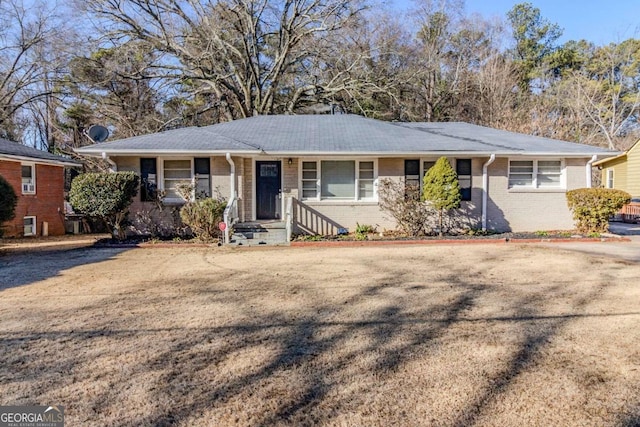 ranch-style house with a front yard