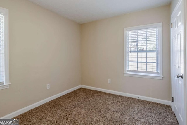 view of carpeted spare room