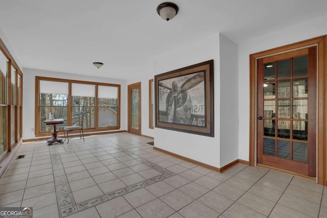 interior space featuring light tile patterned flooring