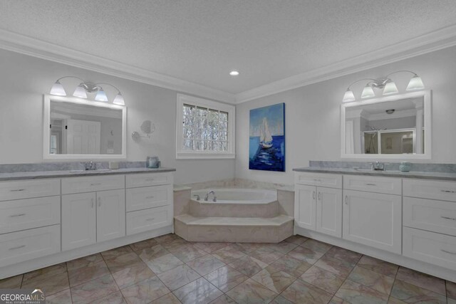 bathroom featuring crown molding, vanity, shower with separate bathtub, and a textured ceiling