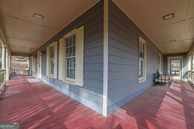 deck featuring covered porch