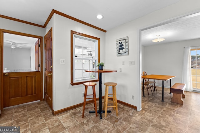 interior space featuring crown molding