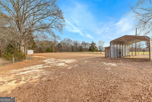 view of yard with a carport