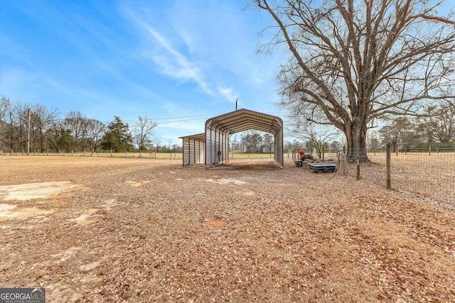 view of yard with a carport