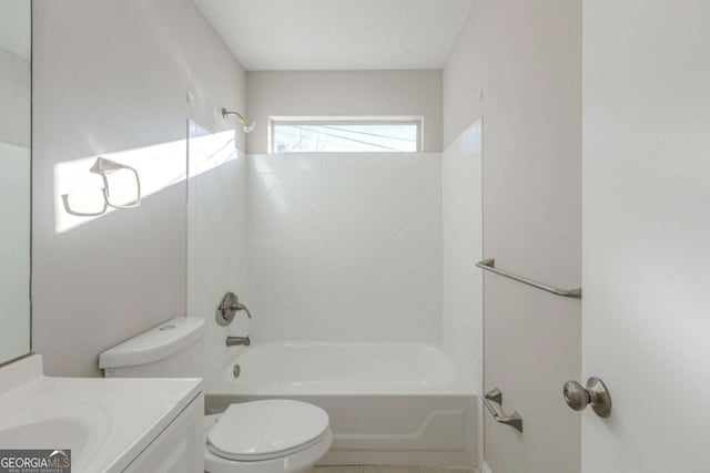 full bathroom featuring shower / bath combination, vanity, and toilet