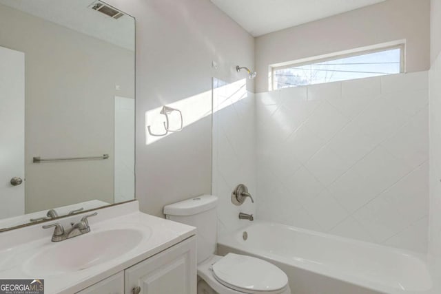 full bathroom with toilet, vanity, and shower / bathing tub combination