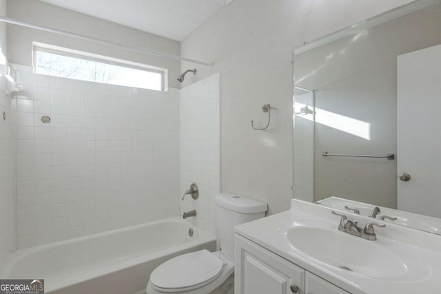 full bathroom with vanity,  shower combination, and toilet