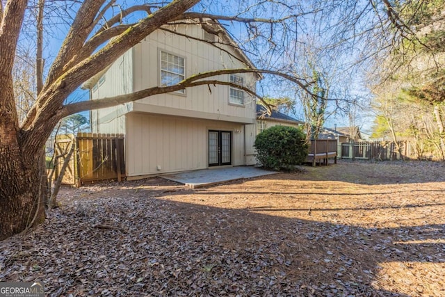 back of house featuring a patio area