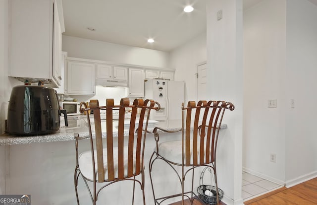 interior space featuring light tile patterned flooring