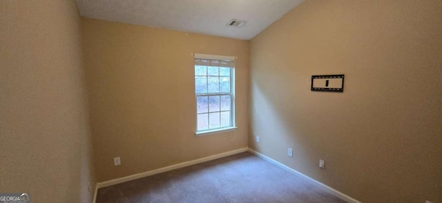 unfurnished room with carpet floors