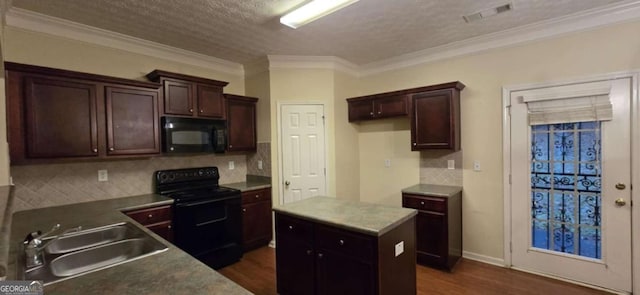 kitchen with crown molding, sink, dark hardwood / wood-style floors, and black appliances