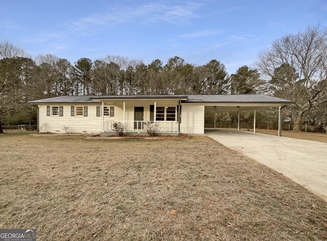 ranch-style house with a front yard, a carport, and covered porch