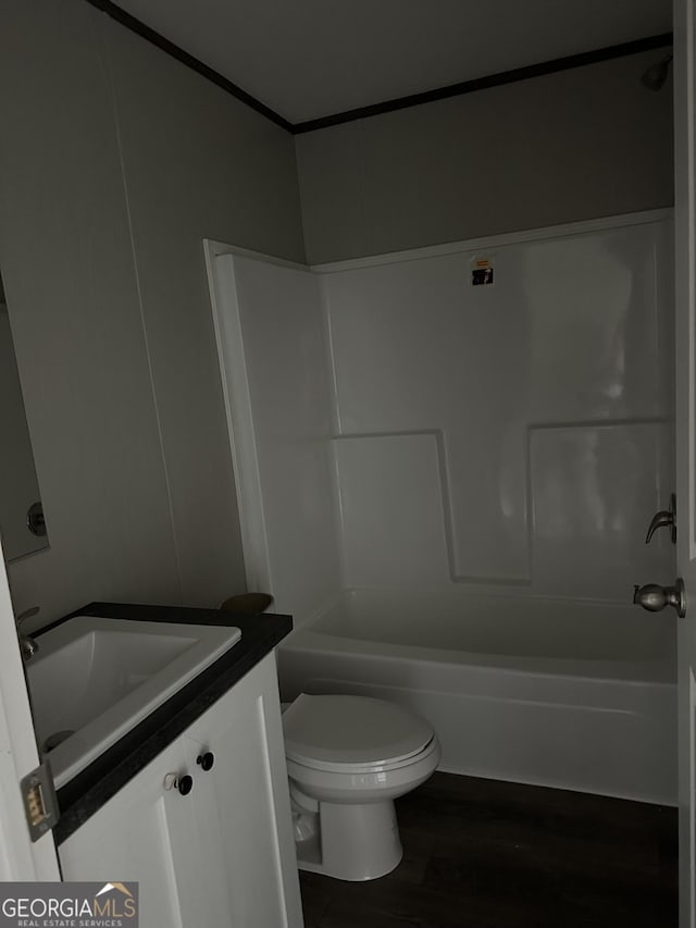 full bathroom featuring vanity, toilet, and tub / shower combination