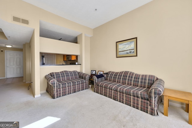 living room featuring carpet flooring