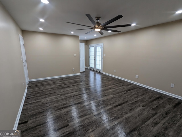 unfurnished room featuring french doors, ceiling fan, and dark hardwood / wood-style flooring