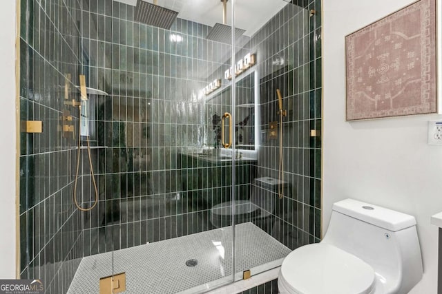 bathroom featuring an enclosed shower and toilet