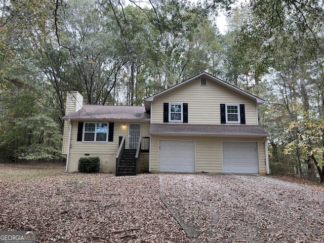 tri-level home featuring a garage