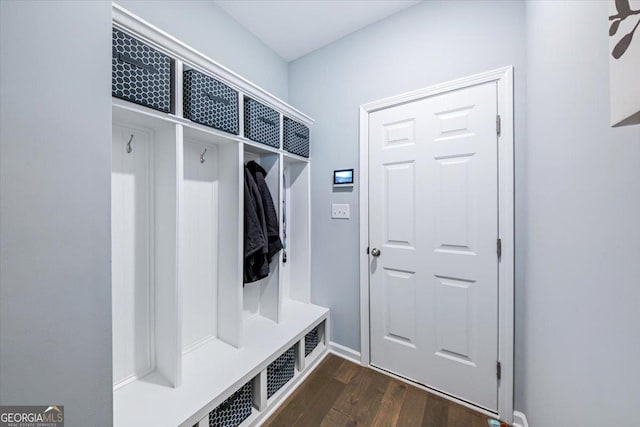 mudroom with dark hardwood / wood-style flooring