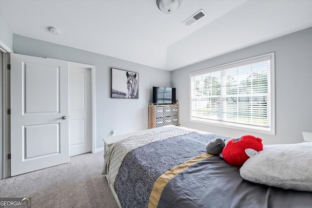 bedroom with light carpet