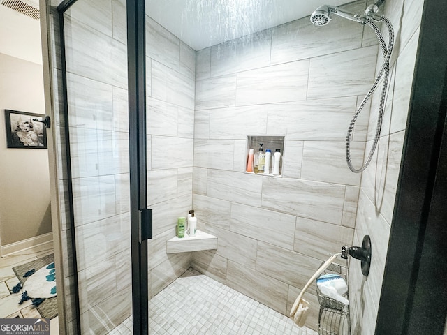 bathroom with an enclosed shower