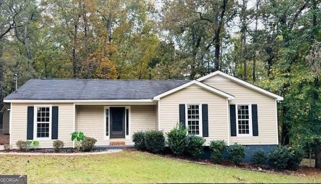 ranch-style house with a front yard