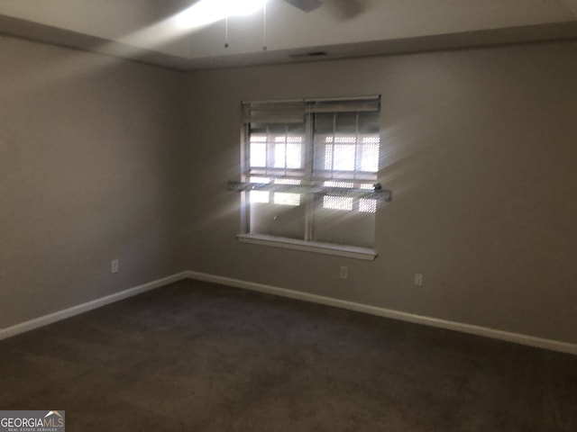 empty room featuring ceiling fan