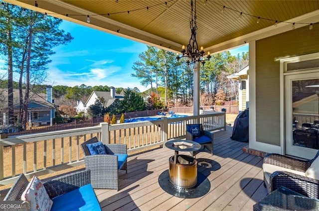 deck with a covered pool