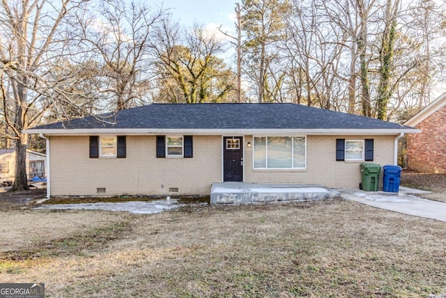 single story home featuring a front yard