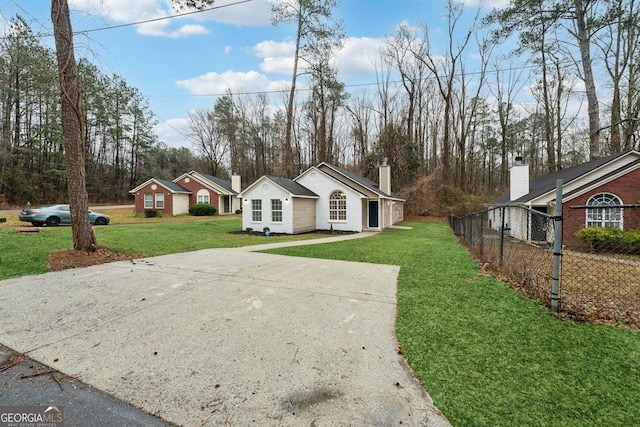 ranch-style house with a front yard