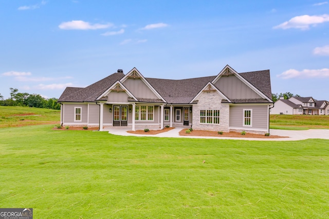 1611 Bethesda Church Rd, Carrollton, GA 30117 - modern farmhouse style home with board and batten siding, a front yard, a shingled roof, and a chimney