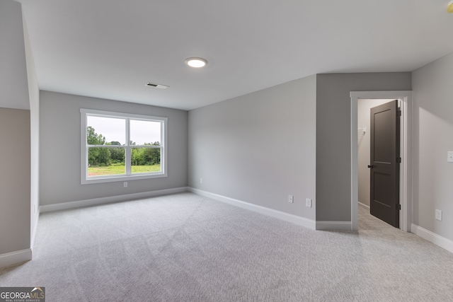 1611 Bethesda Church Rd, Carrollton, GA 30117 - carpeted spare room featuring baseboards