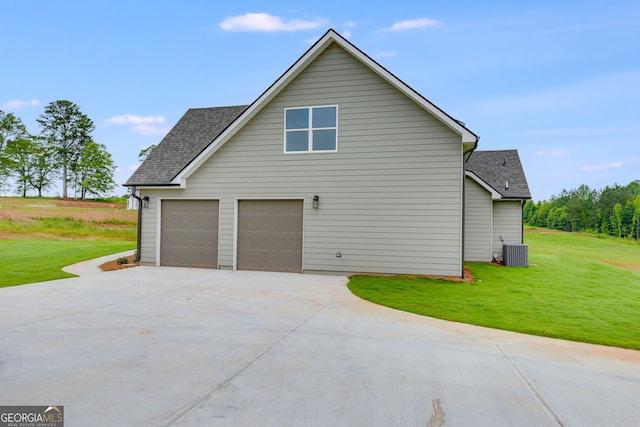 1611 Bethesda Church Rd, Carrollton, GA 30117 - view of property exterior featuring concrete driveway, a shingled roof, a lawn, and an attached garage