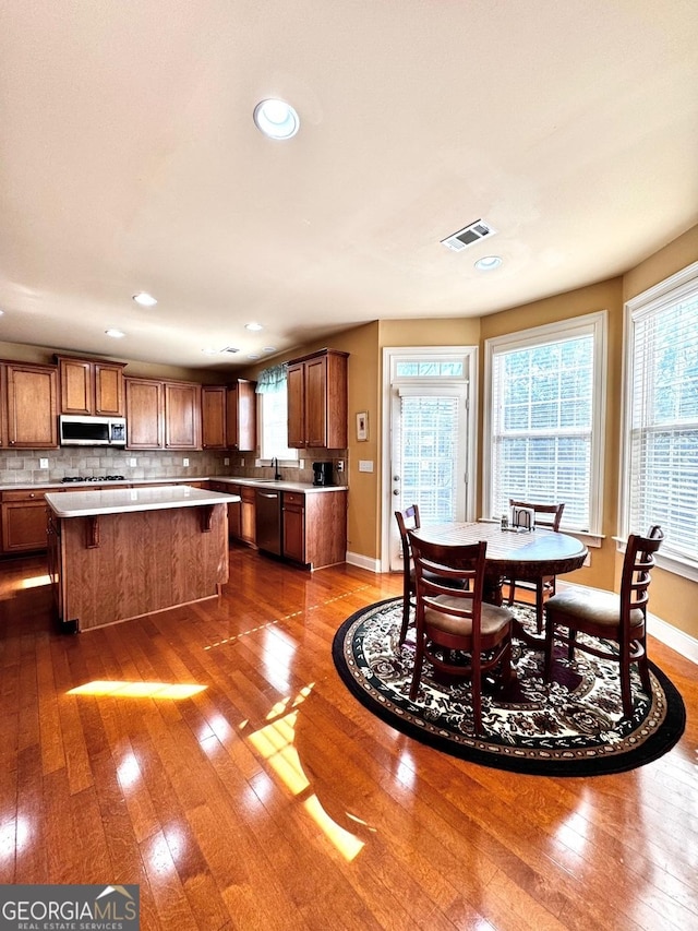 dining room featuring dark hardwood / wood-style flooring