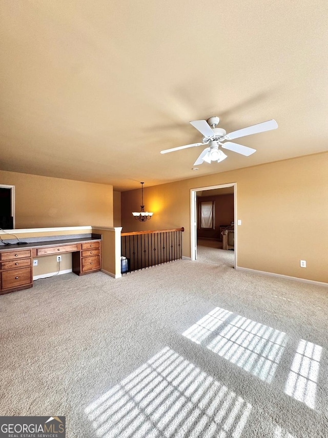 unfurnished room with light carpet and ceiling fan