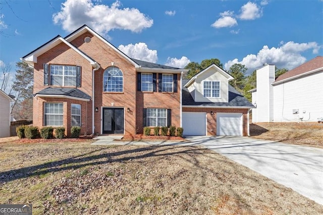 view of front of home with a garage