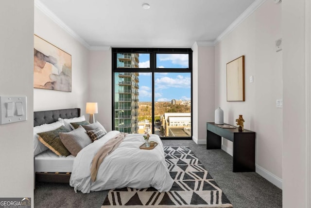 carpeted bedroom featuring crown molding, floor to ceiling windows, and access to outside