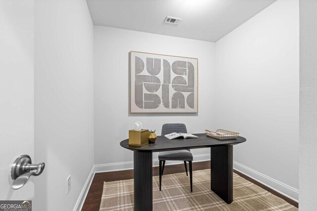 office area with dark hardwood / wood-style flooring